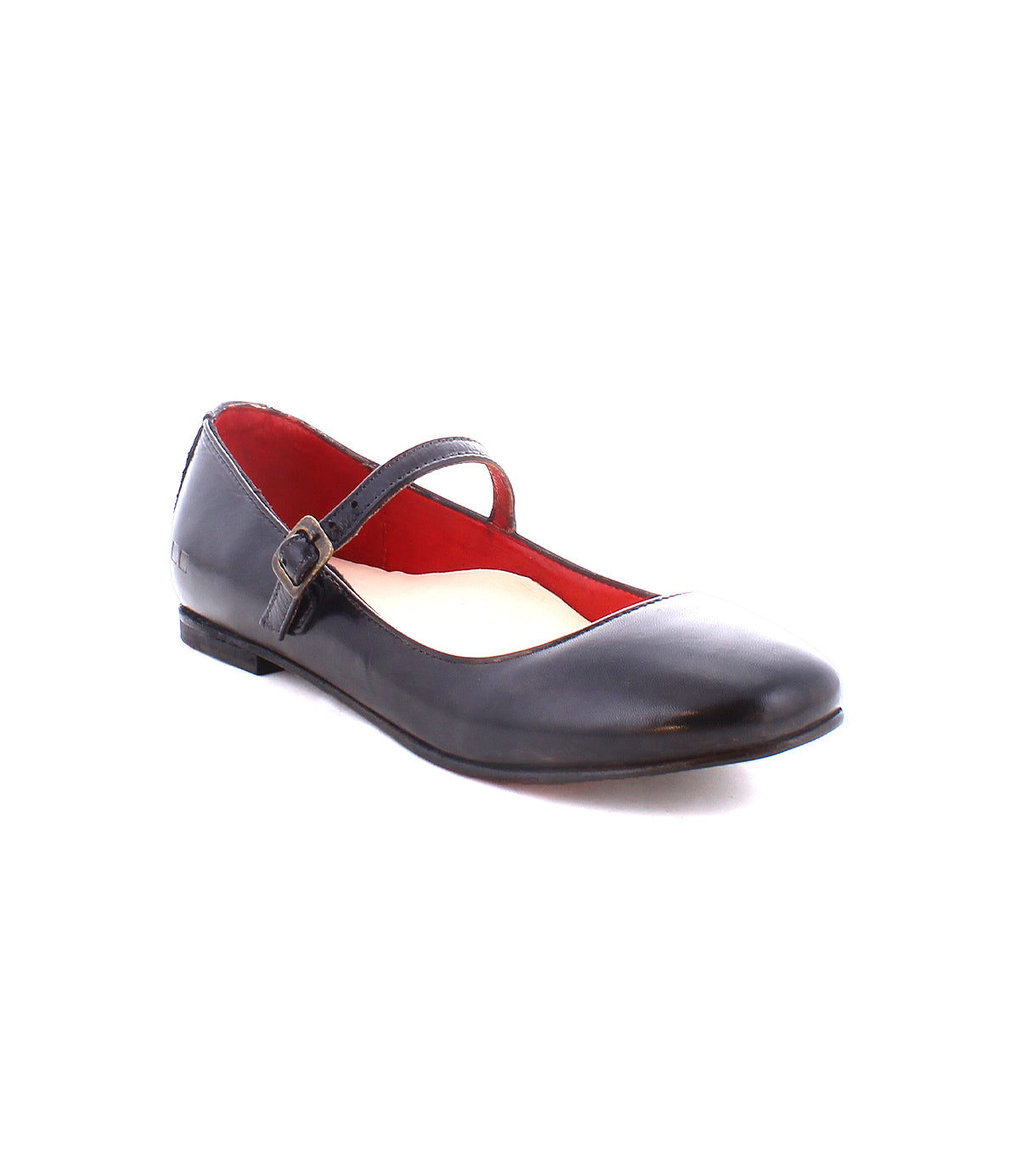 A single black ballet flat shoe with an adjustable strap and buckle across the top, featuring a red interior lining. Perfect for those embracing the ballerinacore trend, the Shuffle III by Bed Stu is a stylish choice.
