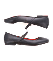 Two black leather Shuffle III ballet flats by Bed Stu with red insides feature an adjustable strap and buckle across the top, displayed side by side against a white background.