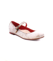 A worn, beige Shuffle III ballet flat by Bed Stu with an adjustable strap and buckle, featuring a red interior lining, set against a white background.