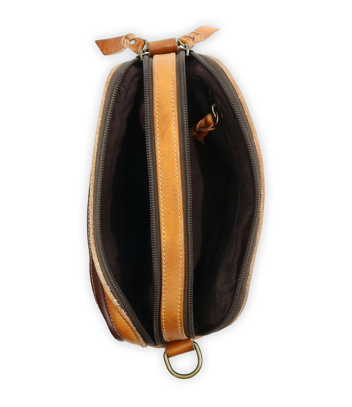 Top view of an open tan leather "Shy" crossbody bag by Bed Stu, showcasing a dark interior with two separate zippered compartments for organizational ease and a metal ring at the bottom.