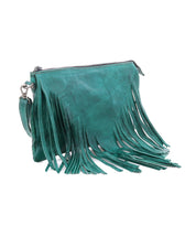 The Bed Stu Silverrock is a teal leather clutch with a zipper closure and long fringe on the front and sides, adding stylish flair to your outfit.
