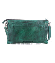 The Bed Stu Silverrock is a green leather small crossbody bag featuring a zip closure, front pocket, and adjustable shoulder strap, shown against a white background.