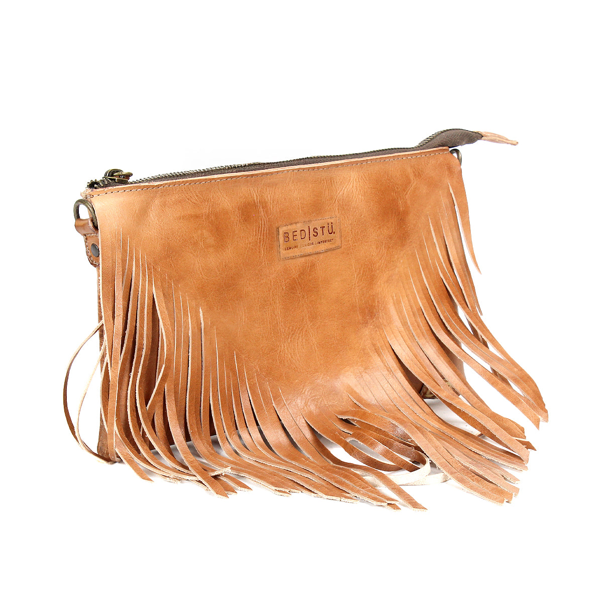 The Bed Stu Silverrock is a tan leather crossbody clutch with the brand logo, long fringe on the front, and a top zipper closure.
