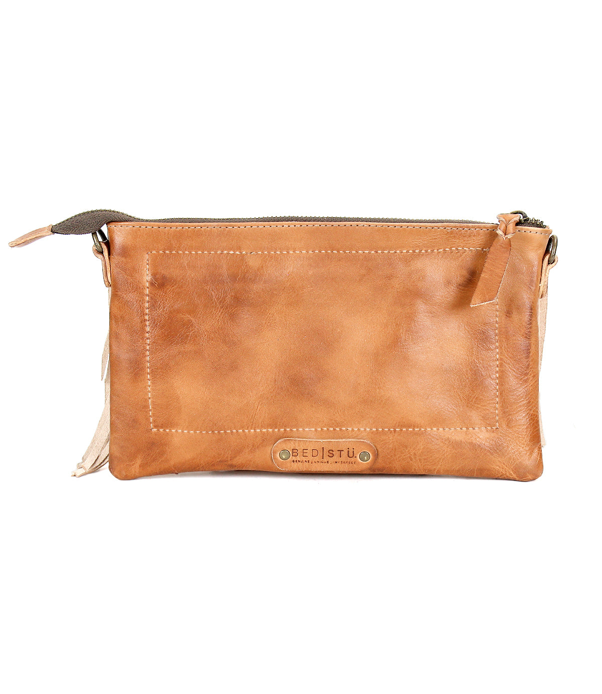A rectangular tan leather crossbody clutch called Silverrock by Bed Stu, featuring a zipper closure and a small "BED|STU" logo tag on the front.