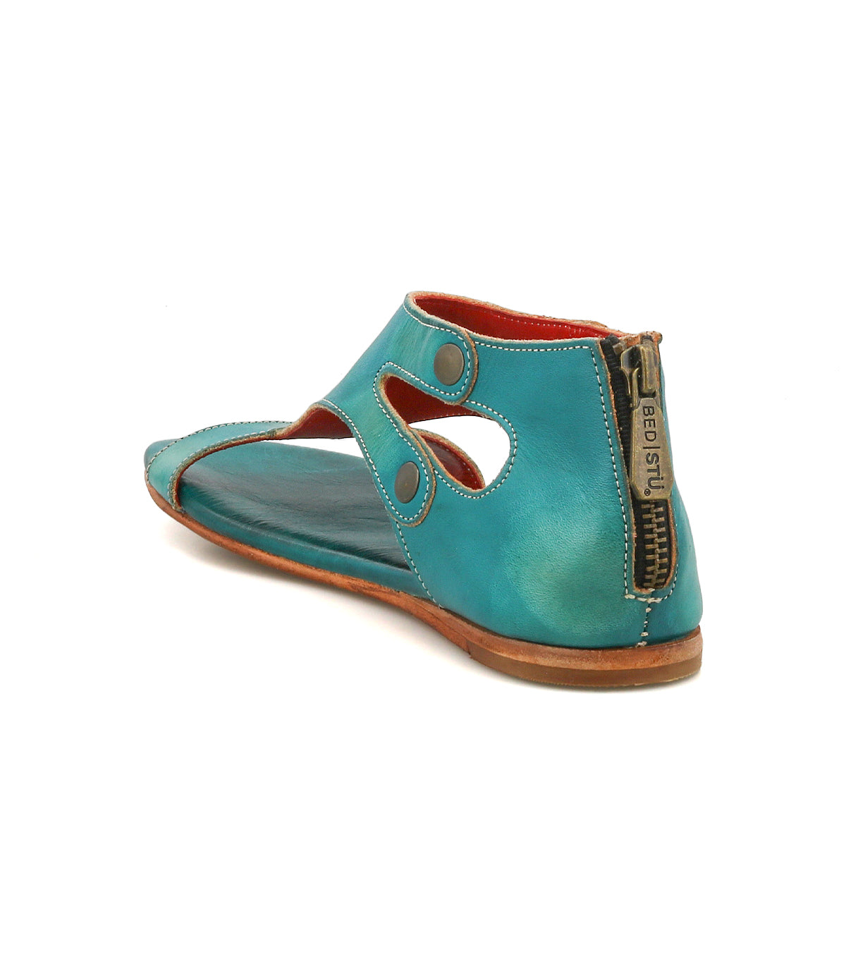 The Bed Stu Soto sandal features teal leather, cutout sides, exposed stitching, a back zipper, thin brown sole, and cushioned footbed—perfect for everyday exploring.