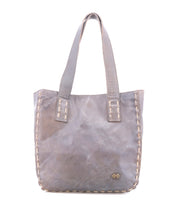 The Stevie tote by Bed Stu features gray leather, double handles, and visible edge stitching. Perfect for everyday use, it includes a small logo patch on the lower front.