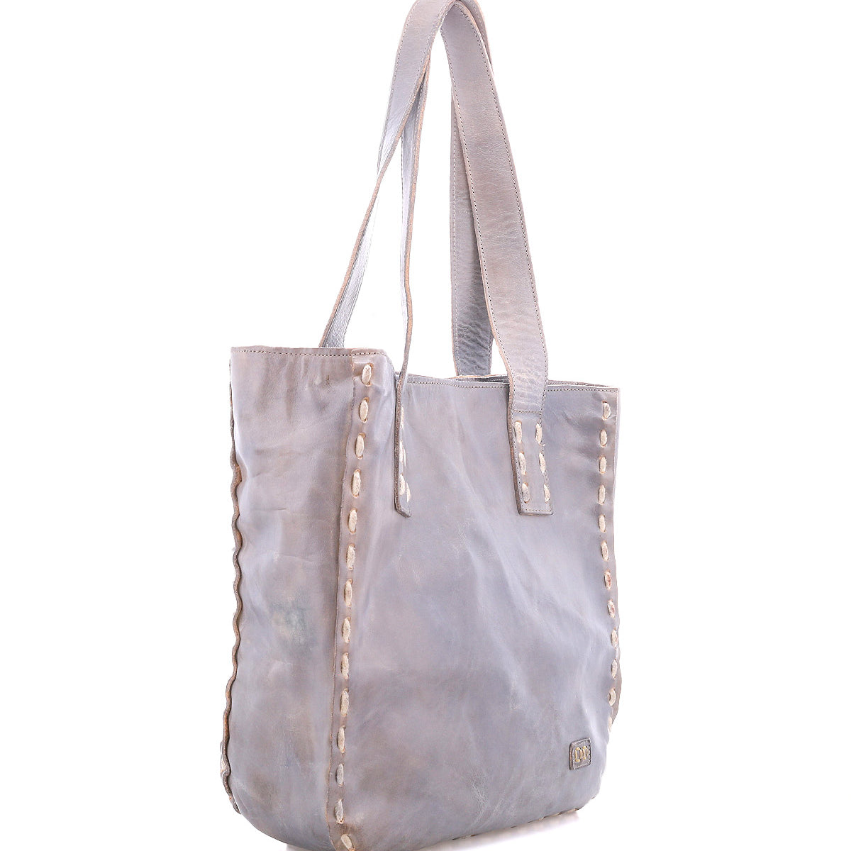 The Bed Stu Stevie is a gray vintage tote featuring wide handles and decorative stitching along the sides and edges, perfect for everyday use, shown on a white background.