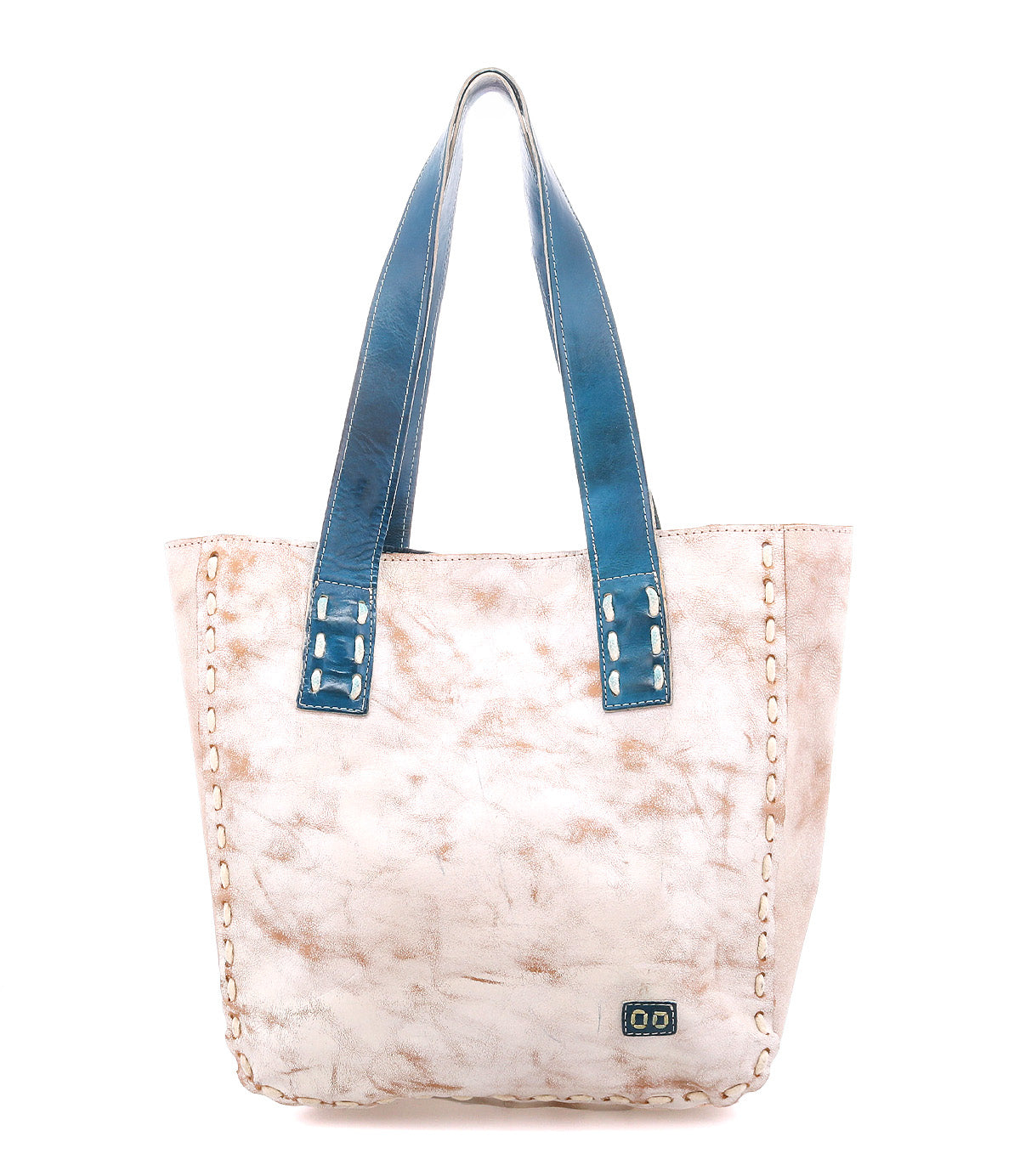 The Stevie by Bed Stu is a beige leather tote bag featuring visible stitching, blue leather handles, and a small rectangular metal logo on the lower front—ideal for everyday use.
