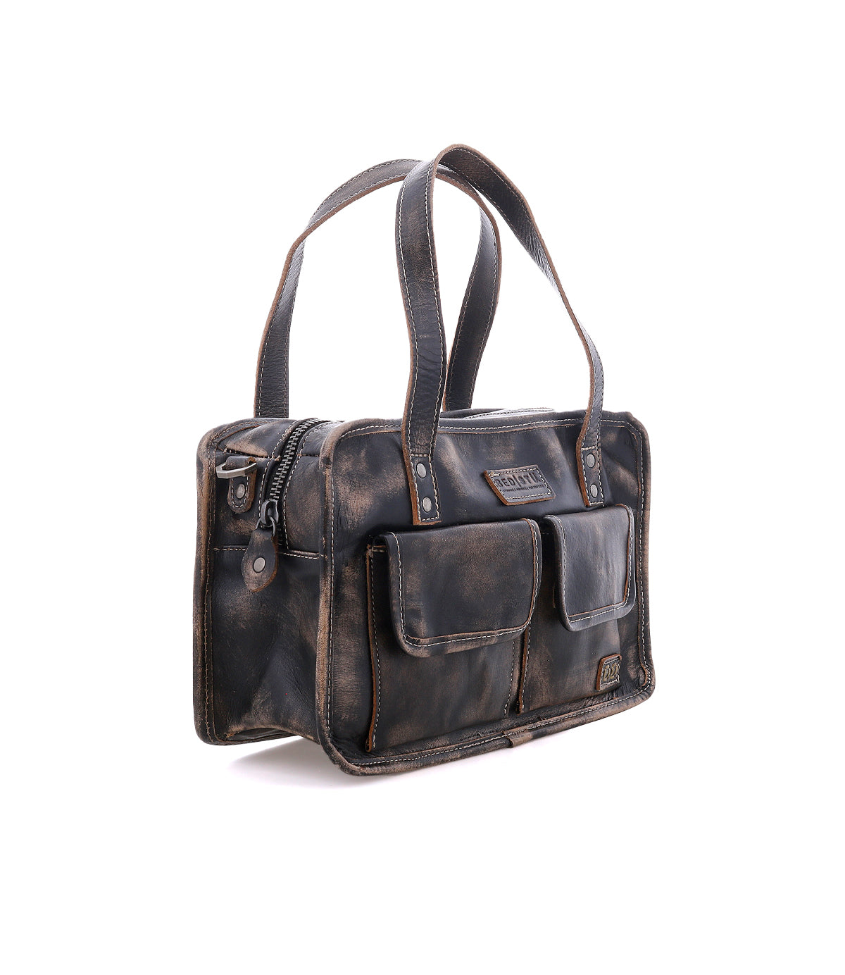 The Bed|Stü Stuffy handbag, crafted from brown distressed leather, boasts dual handles, a structured silhouette, two front flap pockets, a zipper closure, and a spacious interior, shown against a white background.