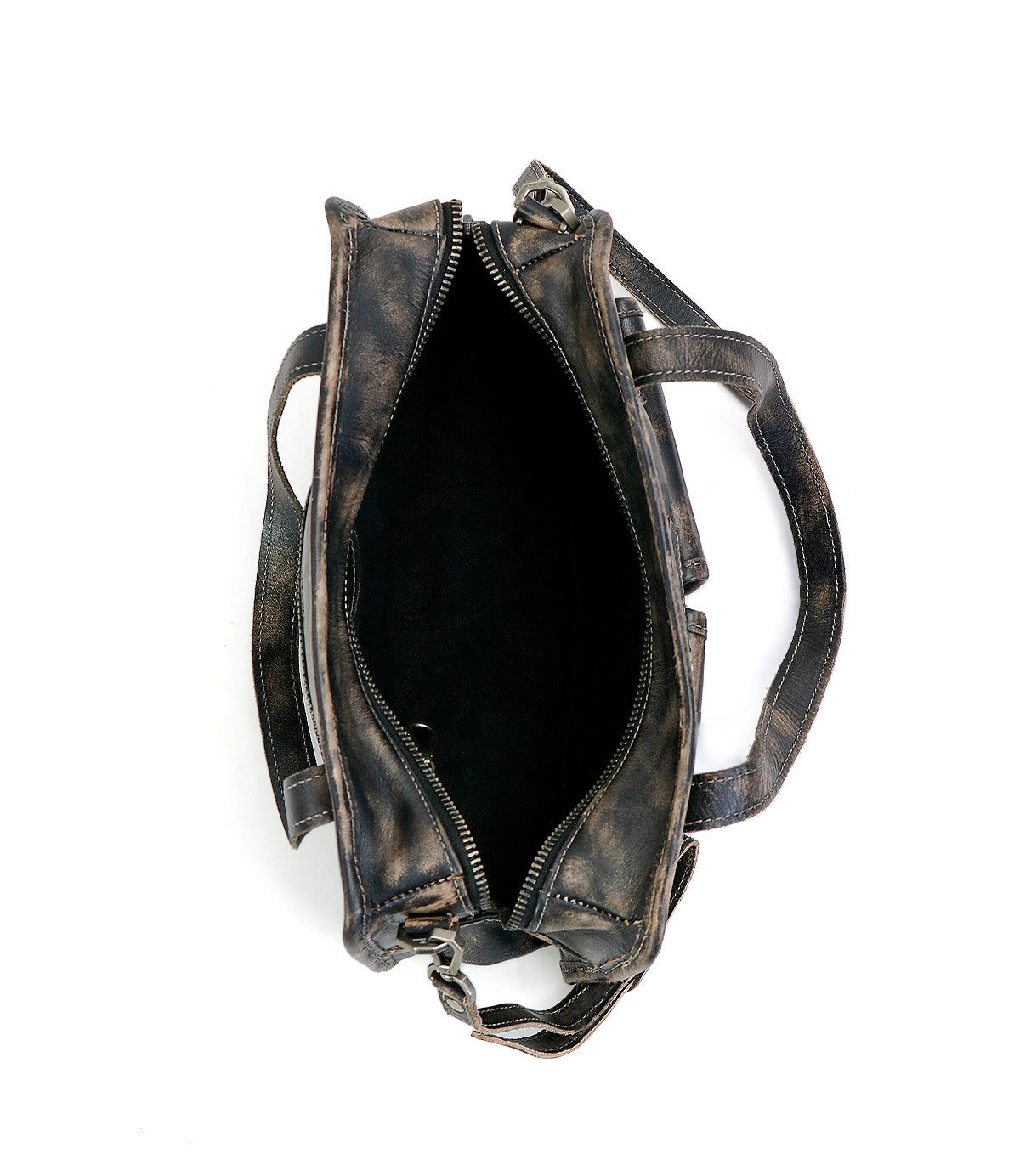 Top view of the Bed|Stü Stuffy bag in distressed leather, featuring a structured silhouette, visible zipper, dark spacious interior, and two handles against a white background.