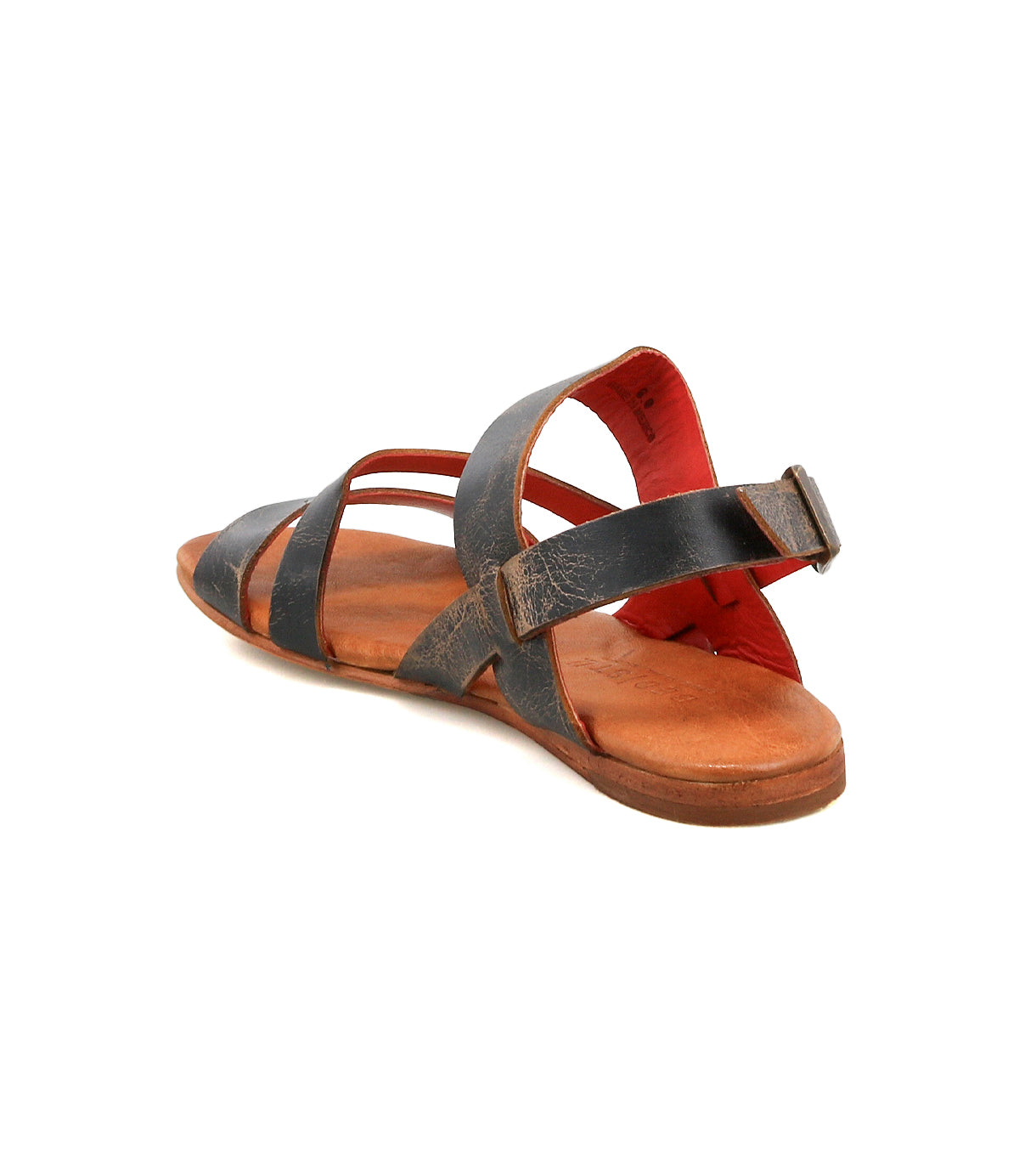 The Bed Stu Superb is a single brown leather sandal with a black adjustable ankle strap and flat sole, shown from the back at an angle on a white background—ideal for everyday wear.