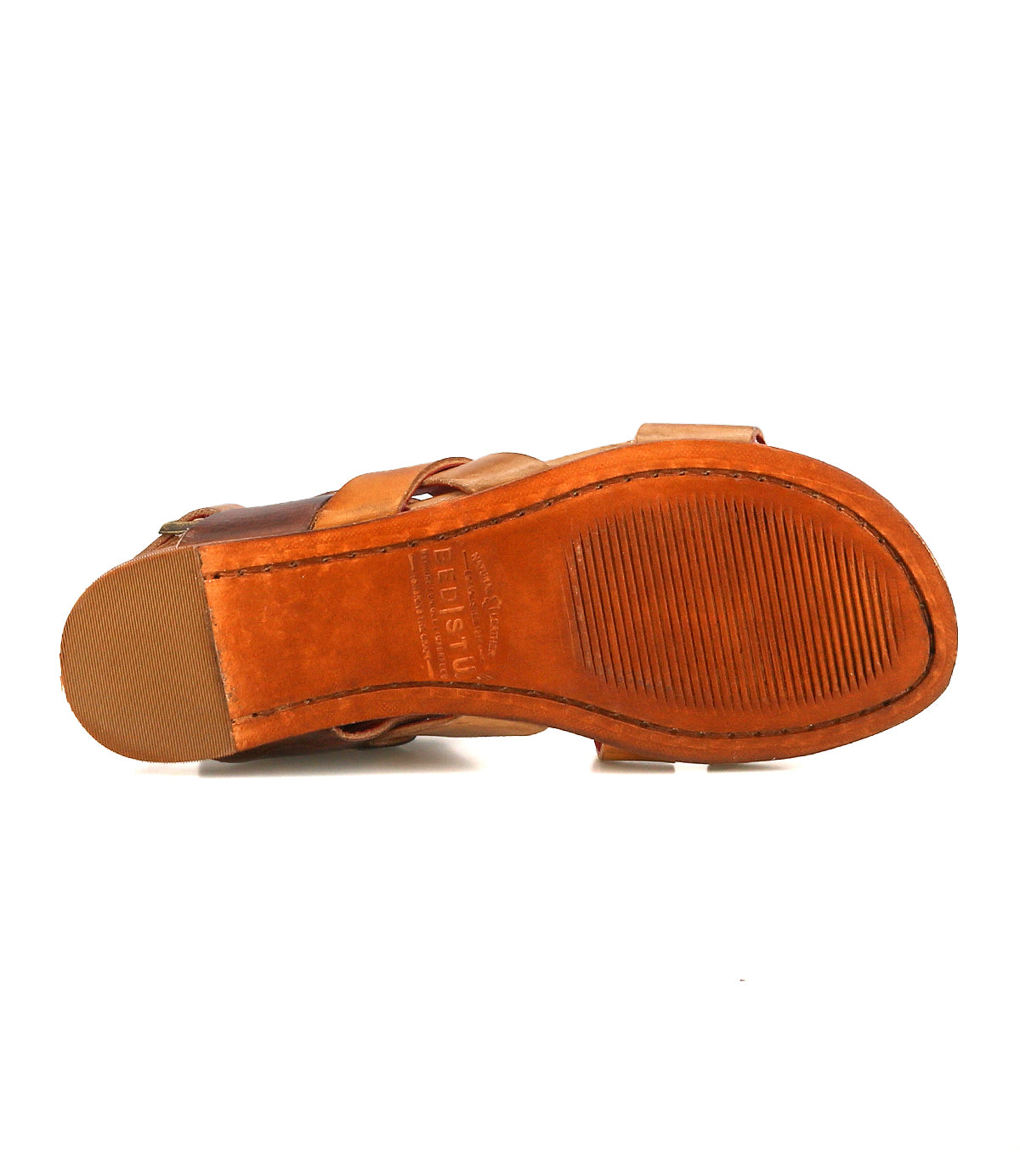 The underside of the Bed Stu Superb brown leather sandal for everyday wear, featuring a tan sole with textured grip and "Superb" branding visible on the arch.