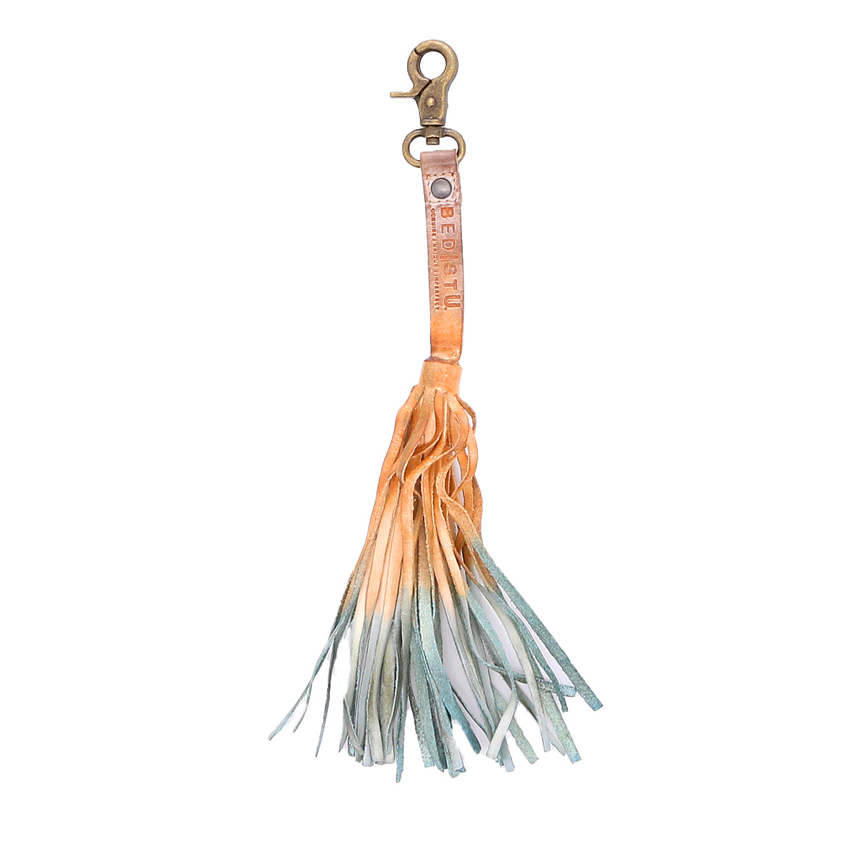 An accessory that serves as both a Bed Stu Tassel Clip and a personal expression piece, featuring an eye-catching orange and blue tassel.