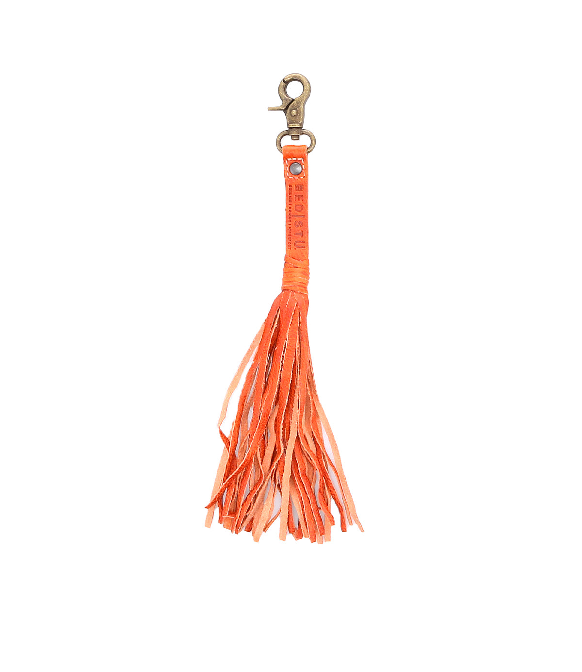 A vibrant orange Bed Stu tassel clip for personal expression on a clean white background.
