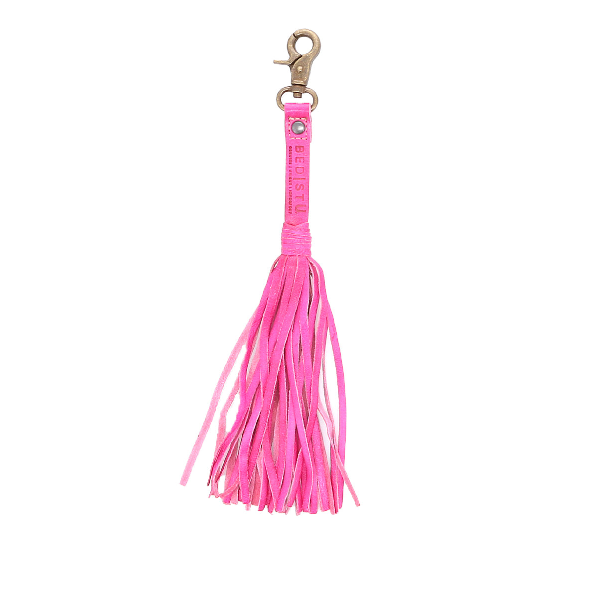 An accessory that combines personal expression with a pink leather keychain featuring a Bed Stu Tassel Clip.