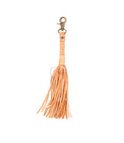 An accessory that allows for personal expression, the Bed Stu peach leather key chain features a stylish Tassel Clip.
