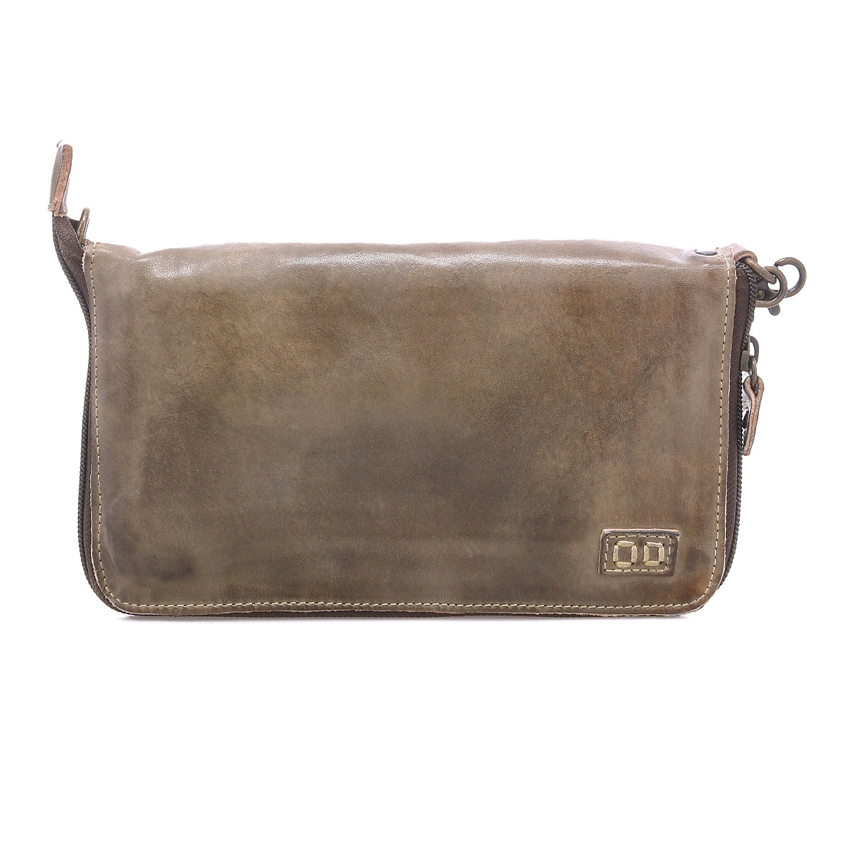 The Bed Stu Templeton II is a rectangular brown vegetable-tanned leather clutch with stitched edges, a zipper closure, and a small embossed logo in the bottom right corner.