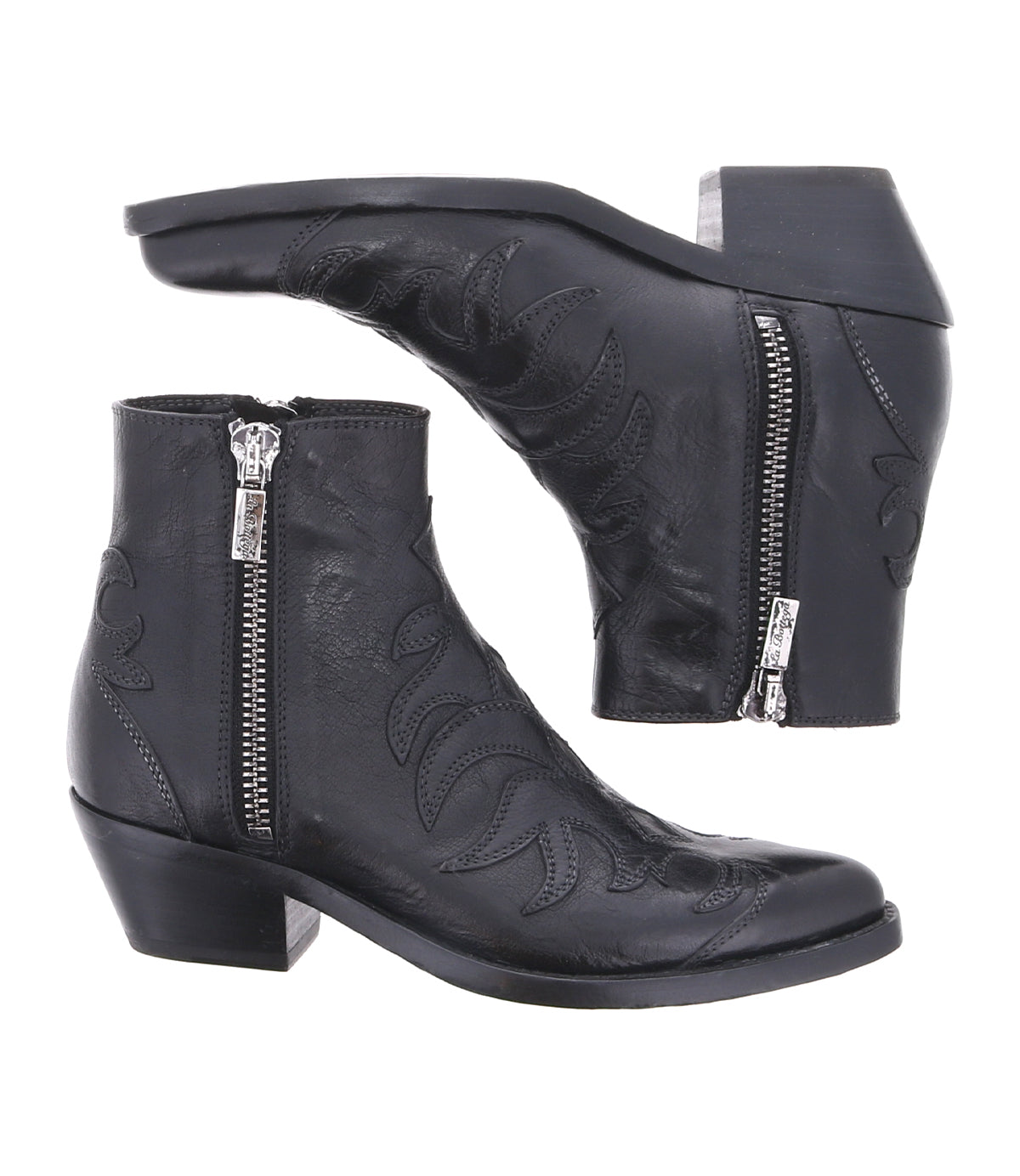 The Bed Stu Tentativa boots are black leather ankle boots with side zippers, low heels, and decorative stitching, inspired by vintage Western style.