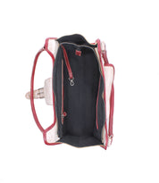 Top view of the Bed Stu Unbending shoulder bag, showcasing a structured silhouette in red and beige washed leather with black lining, an interior zipper compartment, and a key clip.