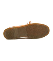 The image shows the brown rubber sole of Bed Stu's Uncle Floyd, a hand-finished leather boat shoe with textured tread patterns and a slightly raised heel.