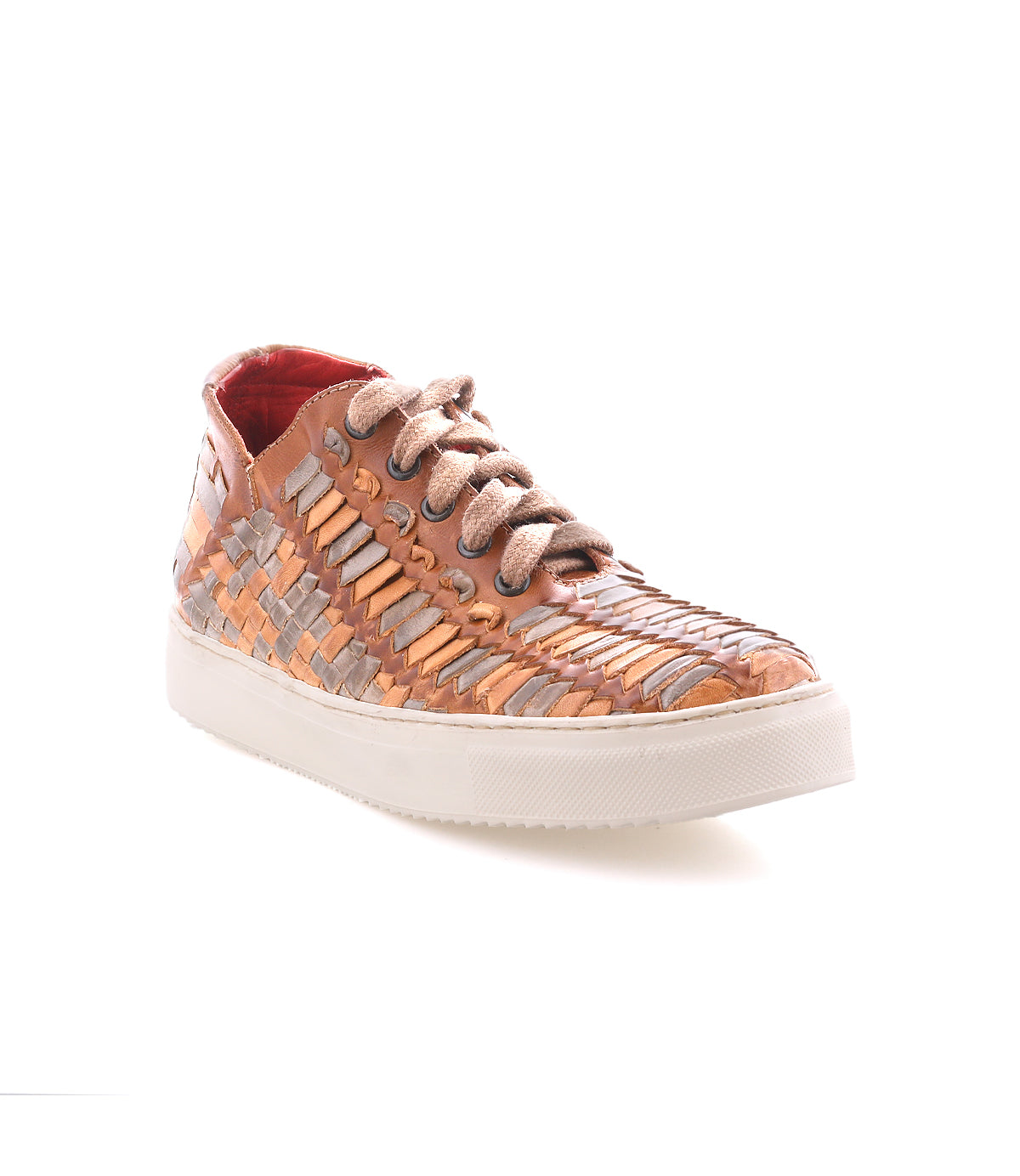 The Bed Stu Unwavering sneaker features handwoven tan, gray, and beige leather strips, beige laces, and a white rubber sole. Displayed against a white background.
