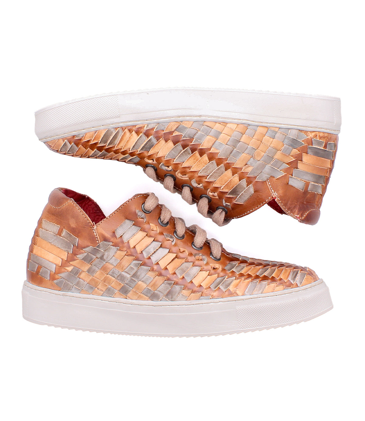 The Bed Stu Unwavering sneakers, featuring handwoven leather with copper and silver metallic strips, white soles, and laces, are displayed side by side on a white background to highlight their unique dimensional pattern.