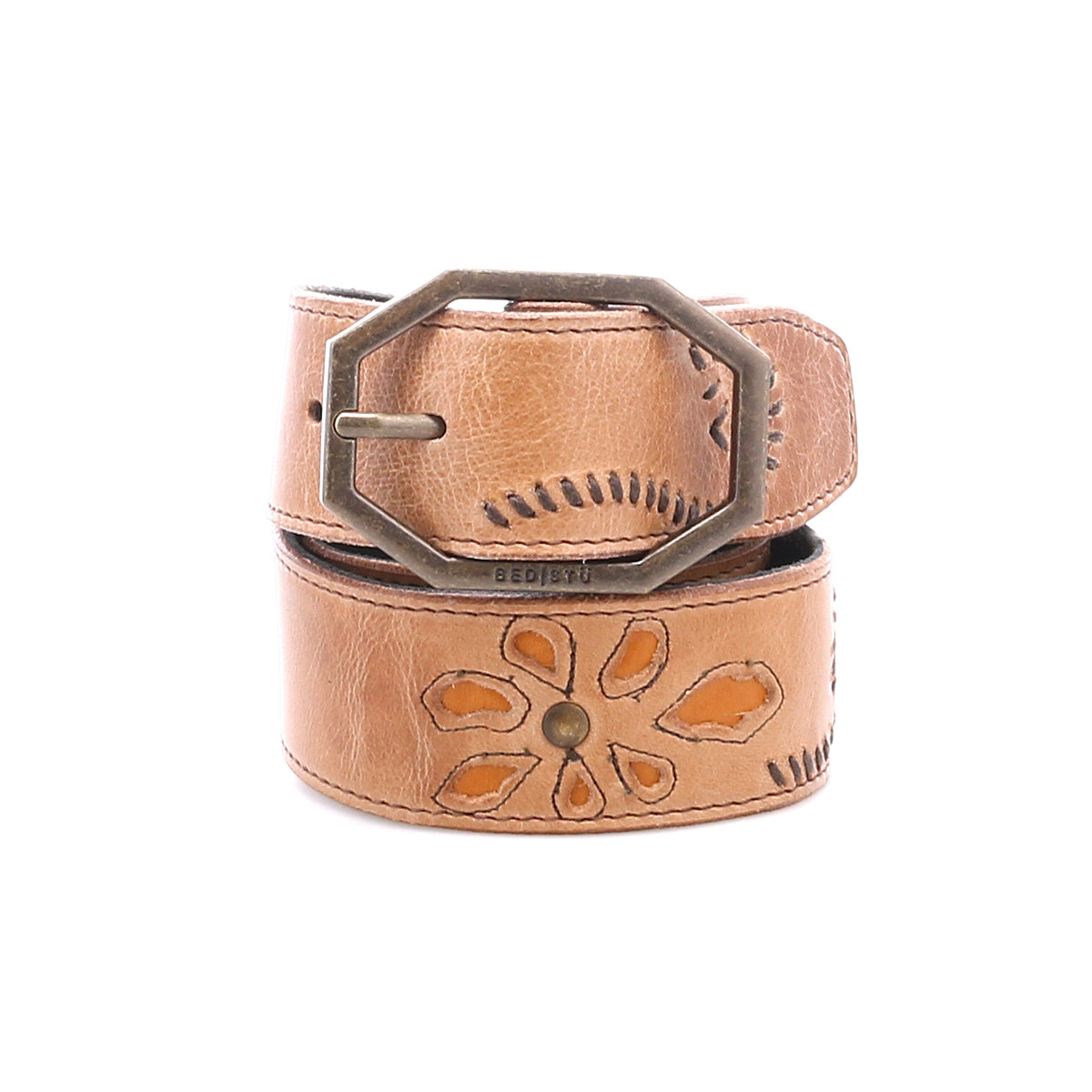 The Bed Stu Upswing II is a tan handcrafted leather belt featuring a floral cutout design, decorative stitching, and an octagonal metal buckle.