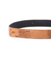 A close-up of the Bed Stu Upswing II, an artisanal handcrafted leather belt with decorative embossed patterns, shown against a white background.