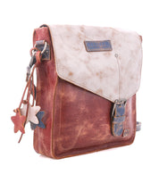 The Bed Stu Venice Beach is a brown and beige full-grain leather crossbody bag featuring a front buckle, star-shaped charms, adjustable strap, and weathered finish, shown on a white background.