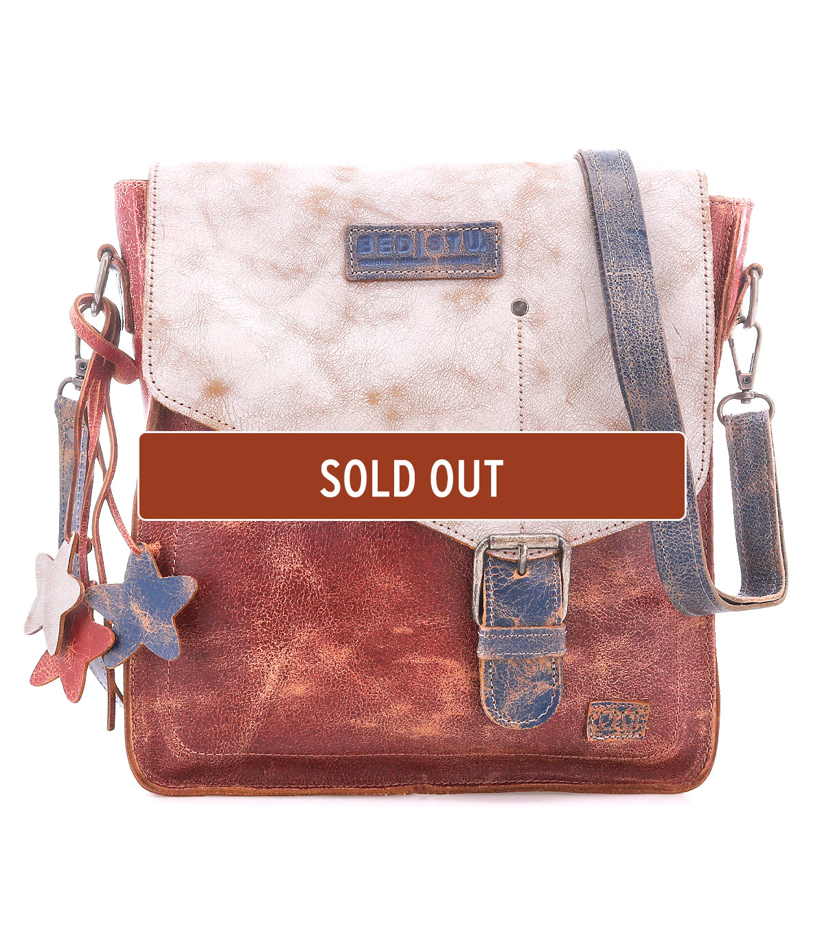 The Bed Stu Venice Beach is a brown and beige full-grain leather shoulder bag with a buckle, star keychains, and adjustable strap. A "SOLD OUT" banner appears across the center.