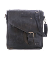 The Bed Stu Venice Beach is a black full-grain leather messenger bag featuring an adjustable shoulder strap, front flap with buckle detail, and Bed Stu branding.