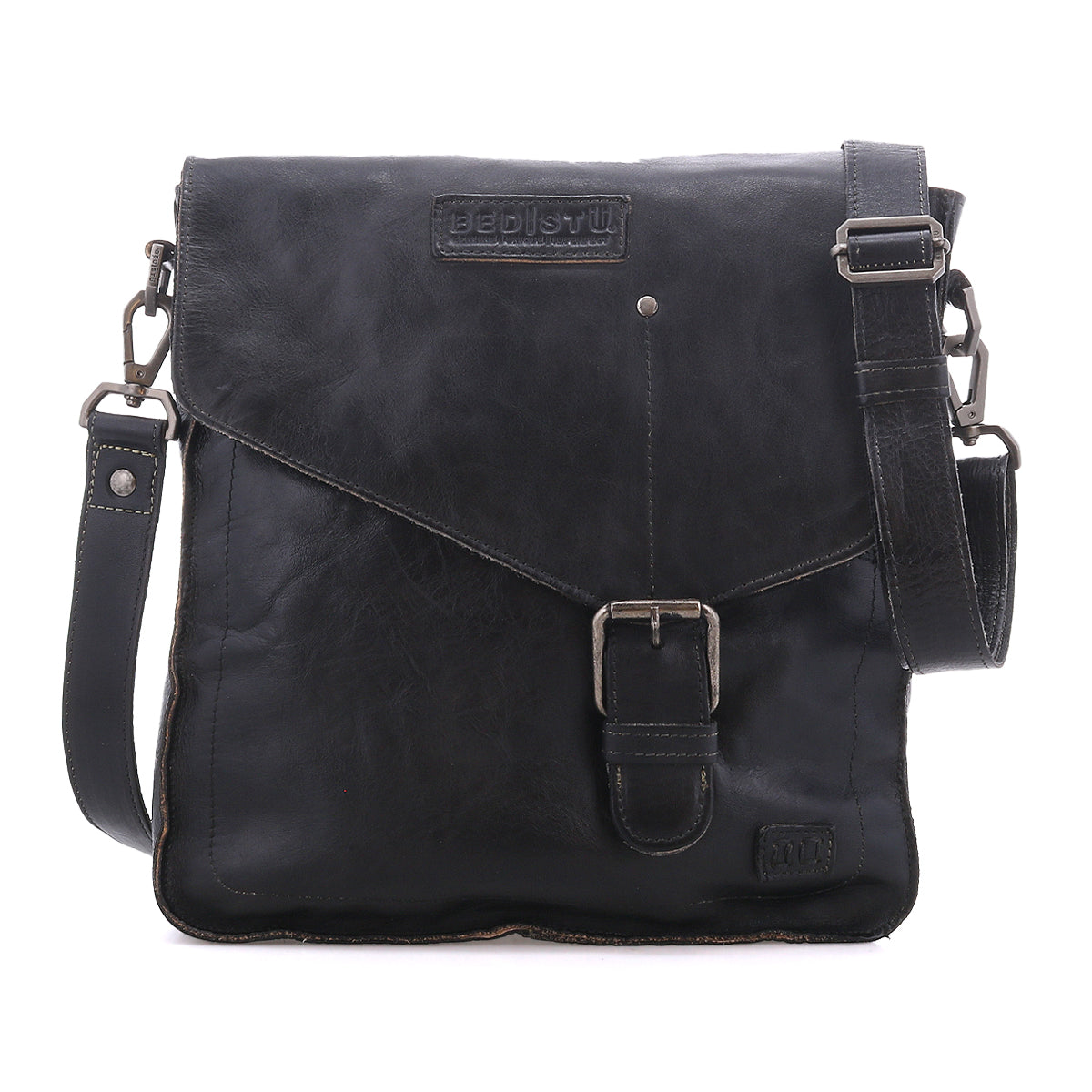 The Venice Beach by Bed|Stü is a black full-grain leather crossbody messenger with a front flap, buckle closure, adjustable strap, and embossed branding.