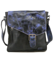 The Bed Stu Venice Beach is a handmade black leather crossbody, featuring a blue marbled flap, secure buckle closure, and adjustable strap—ideal for adding vintage-inspired style to your outfit.