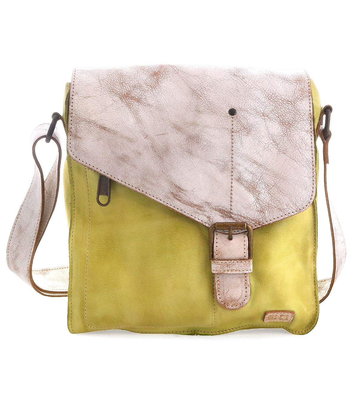 The Venice Beach by Bed Stu is a bohemian-inspired, handmade leather crossbody bag with a yellow body and light brown textured flap. It features a buckle closure and an adjustable shoulder strap, exuding laid-back charm.