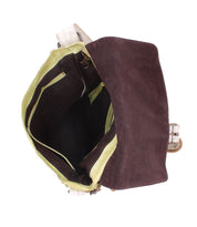 Open Venice Beach backpack by Bed Stu, showcasing a bohemian-inspired design with brown and green canvas, visible interior compartments, and white straps.