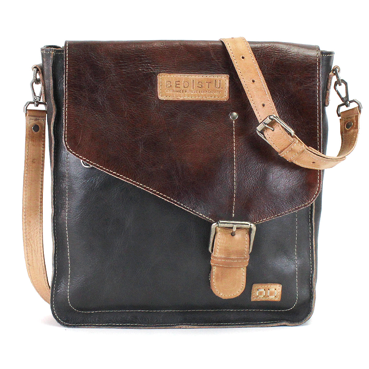 The Venice Beach messenger bag by Bed|Stü is crafted from durable full-grain leather and features a square silhouette with a dark brown flap, tan buckle strap, and an adjustable tan shoulder strap. The brand “Bed|Stü” is embossed on a patch on the flap, emphasizing the versatility of this crossbody bag.