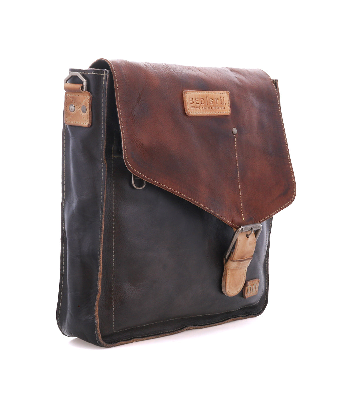 Bed|Stü Venice Beach two-tone full-grain leather messenger bag with a fold-over flap and an adjustable crossbody strap.
