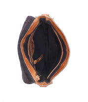 Top view of the Bed Stu Venice Beach, an open brown and black full-grain leather purse with multiple compartments, a zippered pocket, and an adjustable strap on a white background.