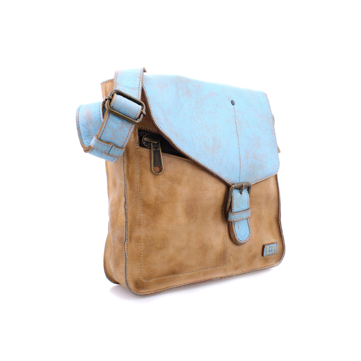 A vintage-inspired masterpiece of a Venice Beach brown leather crossbody bag with a strap by Bed Stu.