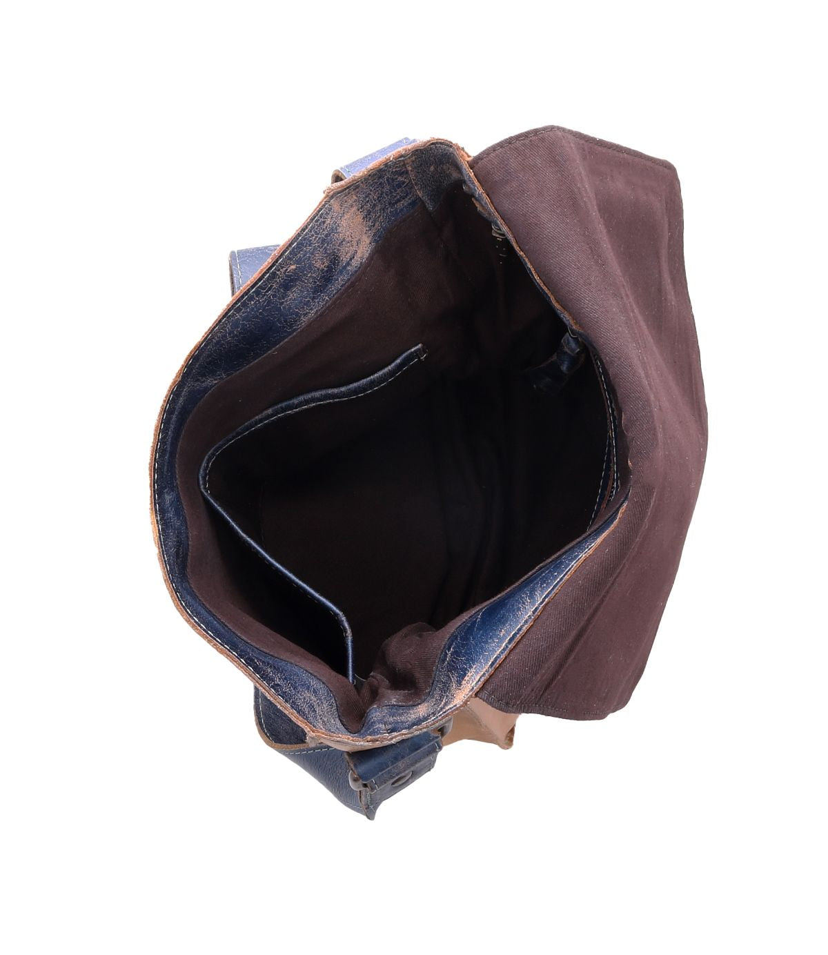 A top view of the open, empty Bed Stu Venice Beach handbag showcases its quality craftsmanship and bohemian-inspired design through the intricate interior lining.