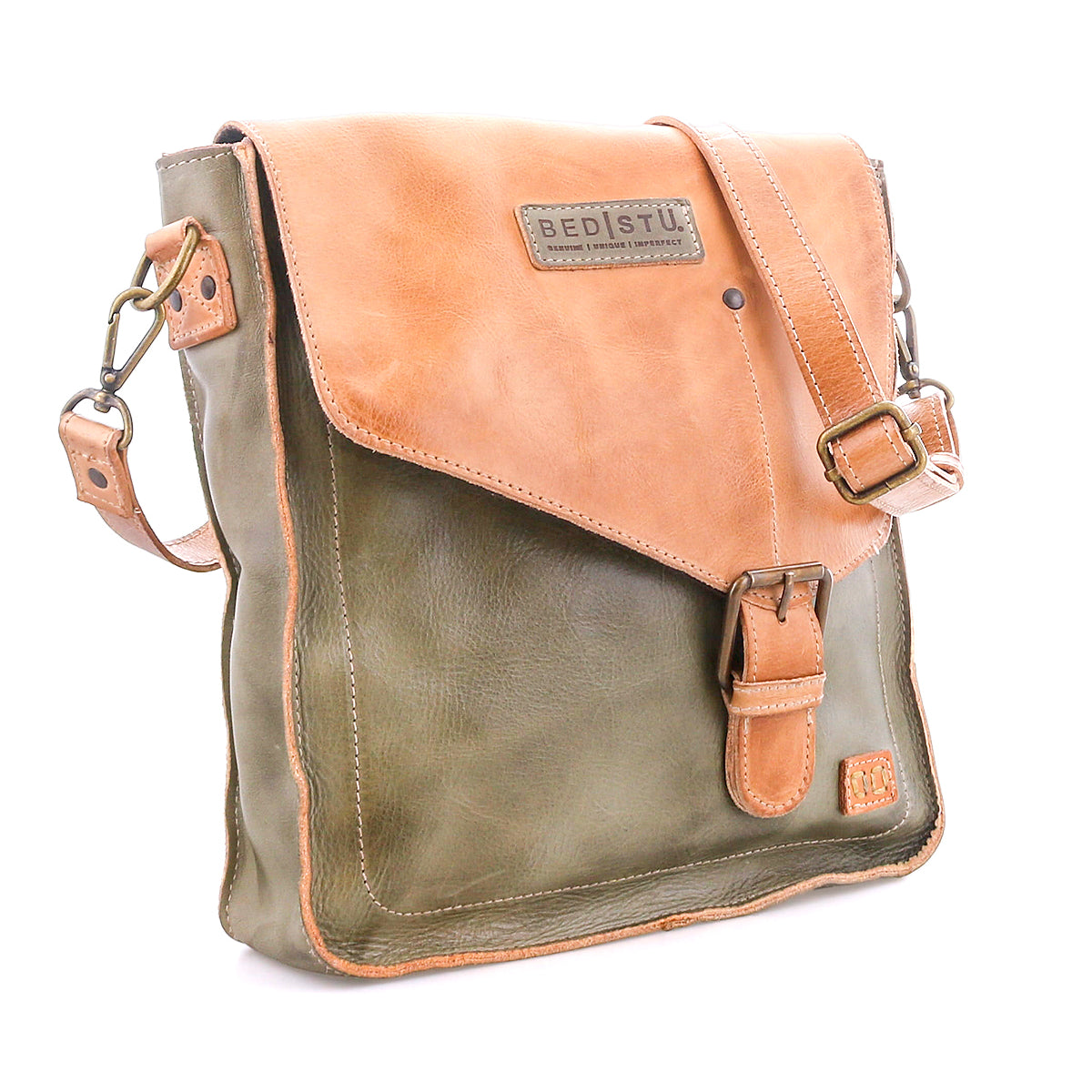 The Bed Stu Venice Beach is a two-tone full-grain leather crossbody bag featuring a tan flap, green body, adjustable strap, and buckle closure.