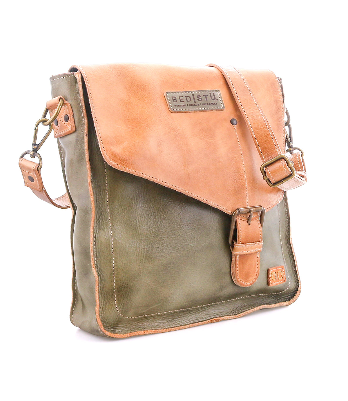The Bed Stu Venice Beach is a two-tone full-grain leather crossbody bag featuring a tan flap, green body, adjustable strap, and buckle closure.