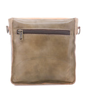The Bed Stu Venice Beach crossbody bag in olive green full-grain leather features a front zippered pocket and side rings for strap attachment, shown on a white background.