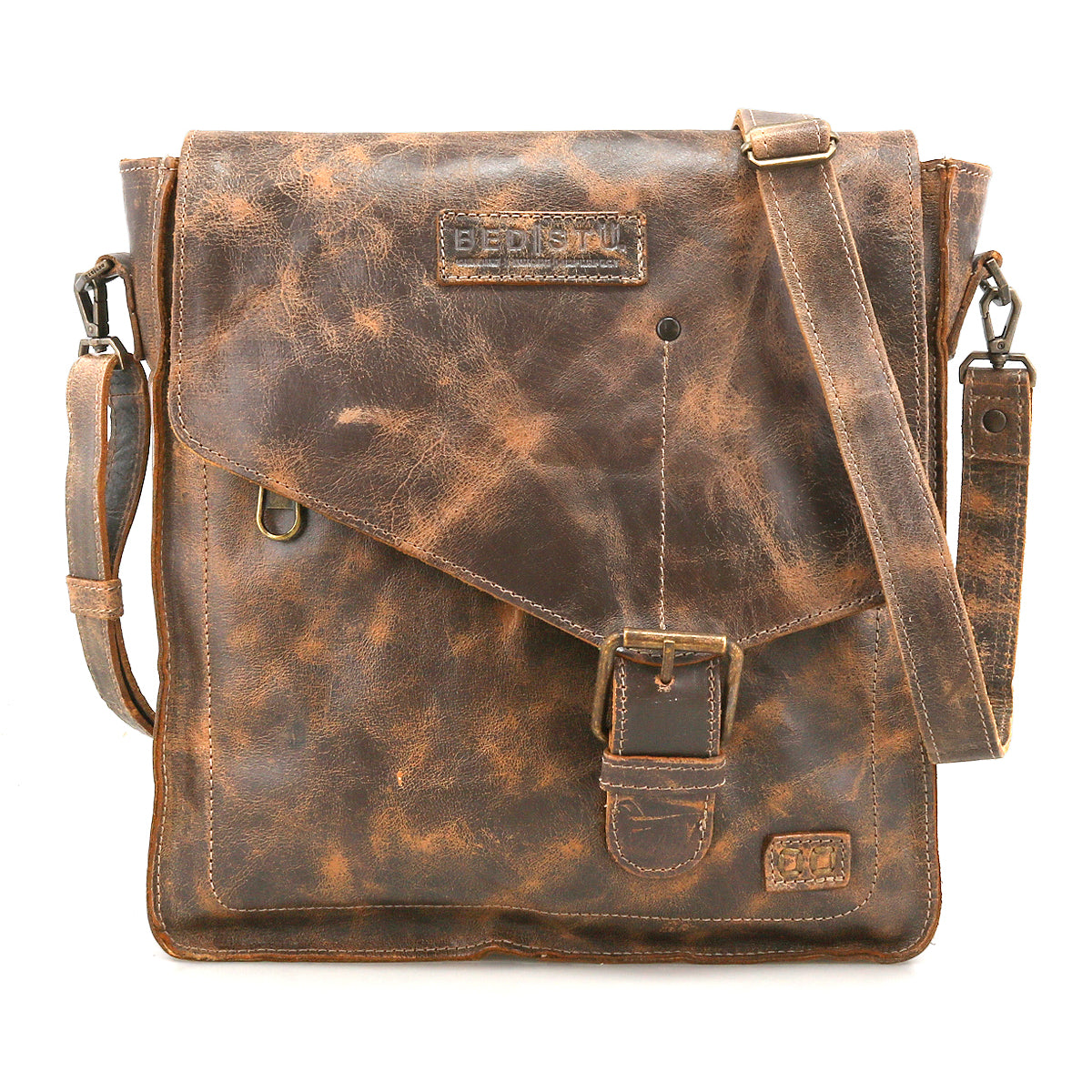 The Bed Stu Venice Beach is a vintage-inspired worn brown leather shoulder bag with a flap, buckle closure, adjustable strap, and embossed branding on the front.