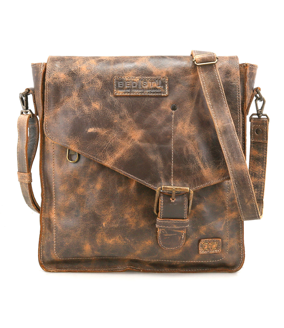 The Bed Stu Venice Beach is a vintage-inspired worn brown leather shoulder bag with a flap, buckle closure, adjustable strap, and embossed branding on the front.