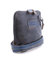A black and Bed Stu Ventura blue leather gem cross body bag.