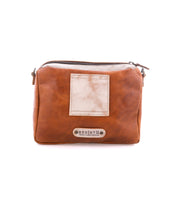 Bed Stu Viana II tan leather crossbody bag featuring a square front patch and a zippered closure.