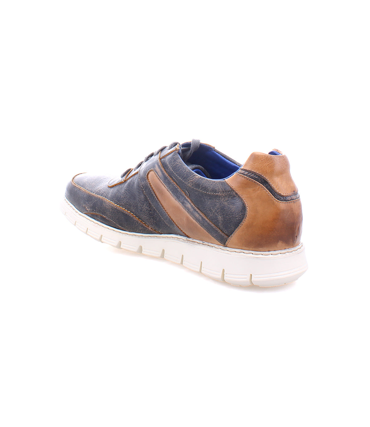 A single Wardell distressed brown and blue leather sneaker with white soles, isolated on a white background.