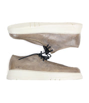 The Webmaster by Bed Stu is a stylish men's sneaker featuring a tan leather design with black laces and white rubber soles, providing all-day comfort. They are showcased sideways for a classic view.