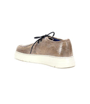The Webmaster by Bed Stu is a sleek men's sneaker design with brown leather, black laces, and a white sole, viewed from the back angle, embodying all-day comfort.